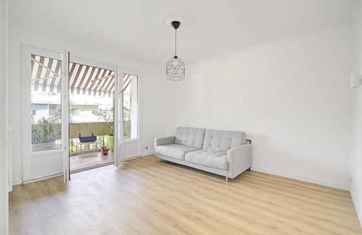 Appart T3 traversant 59 m², deux terrasses, cave et parking — photo 3