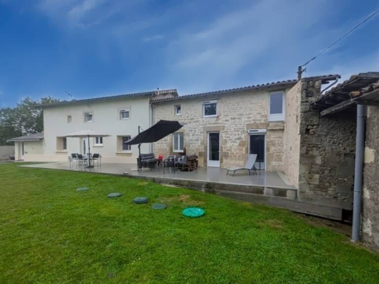 MAISON EN PIERRE RÉNOVÉE – 208 M² – 5 CHAMBRES – VIE DE PLAIN-PIED – TERRAIN 1 000 M² – A 8 MINUTES DE SAINT-MAIXENT — photo 1