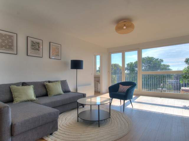 Appartement T3 de 85 m² avec garage, cave et parc privatif — photo du bien