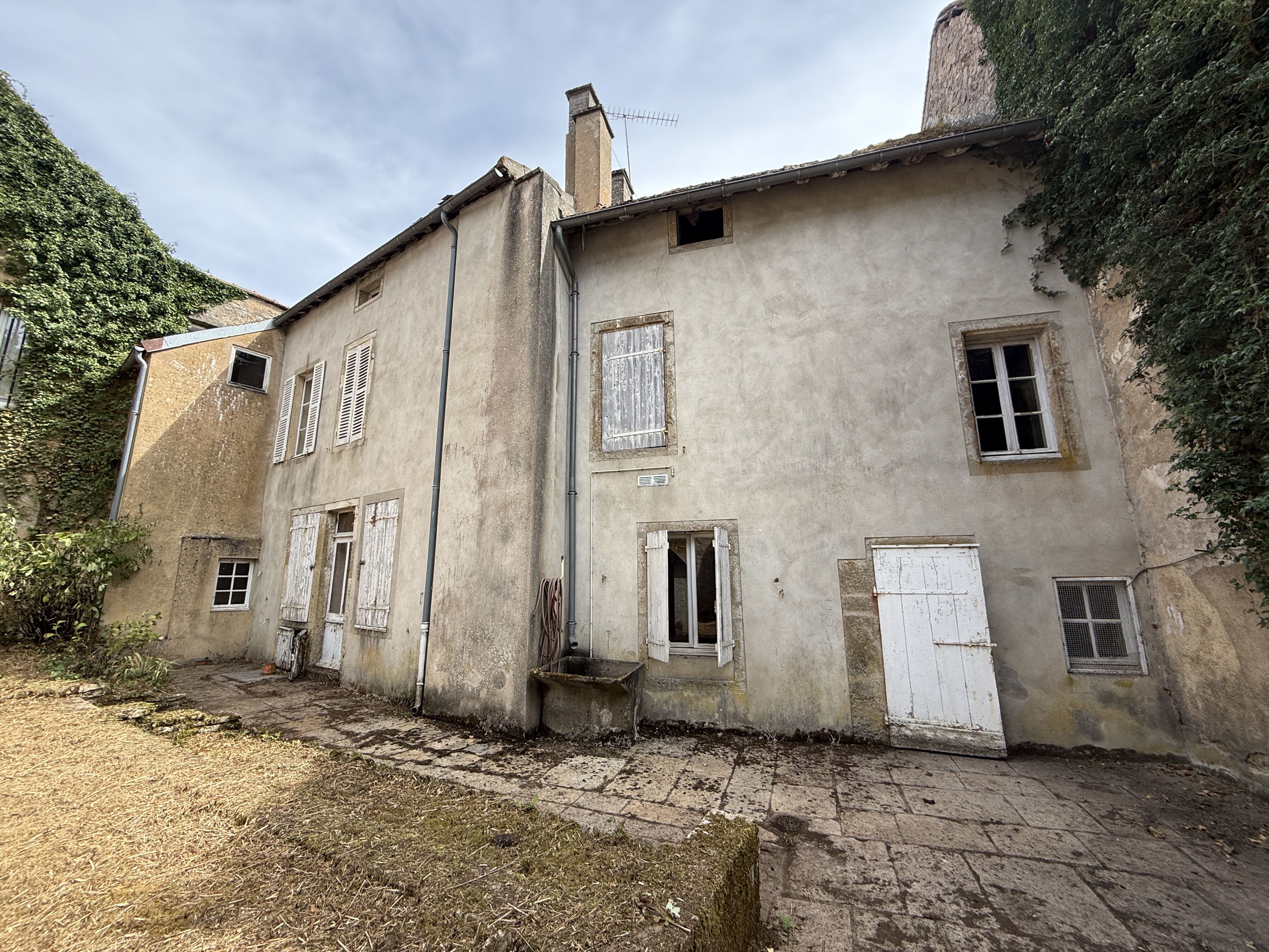 Maison de ville avec garage et jardin