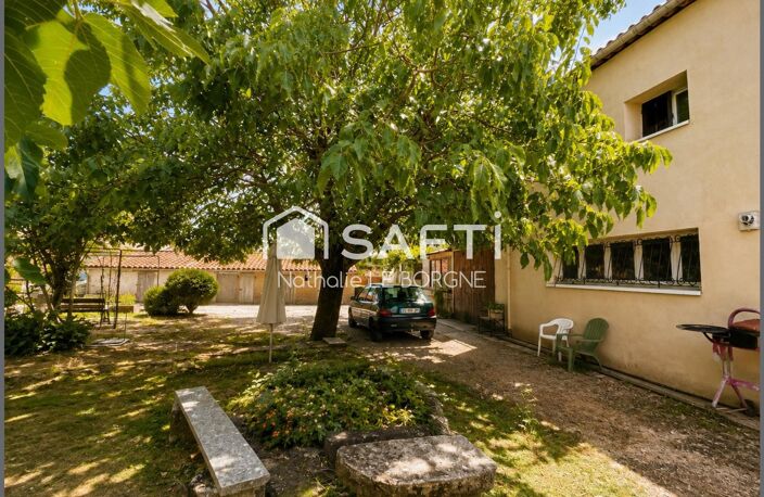 Ensemble immobilier maison + immeuble + terrain — photo 4