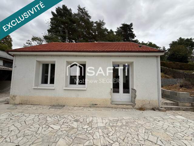 Maison de 80 m² avec 2 chambres, dépendance, atelier et 2 garages, dont un de 40 m² : un bien plein de potentiel pour réaliser votre projet. — photo du bien