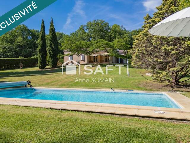 Plain-pied avec piscine et jardin arboré — photo du bien