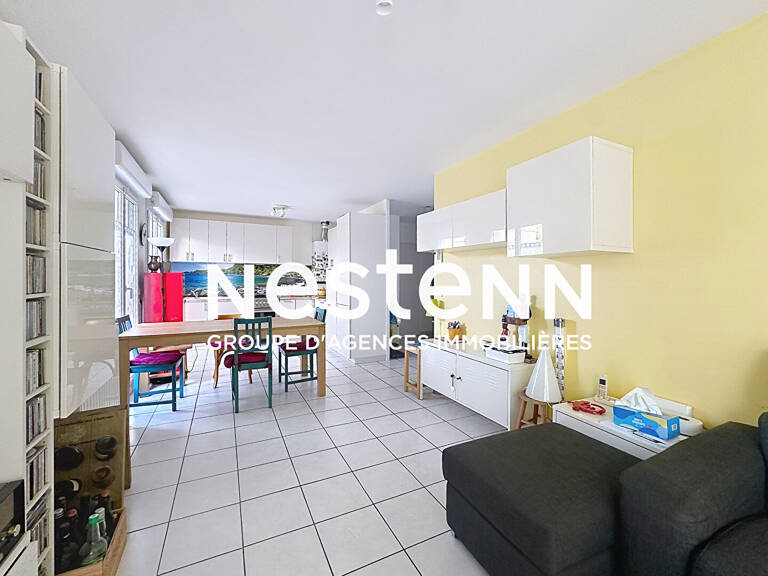 Appartement en rez de jardin 3 pièces 2 chambres avec cave - 69500 BRON — photo 1