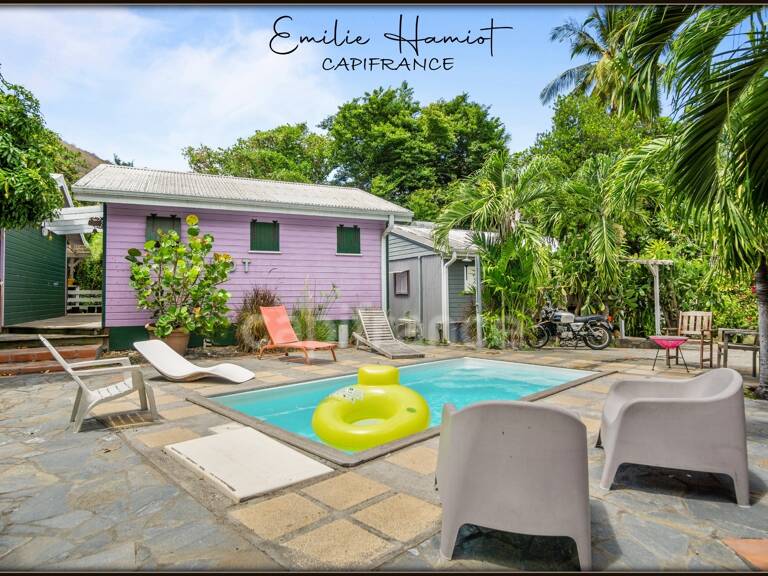 A louer sur Case Pilote - Fond Boucher - Appartement en RDC 4 pièces - jardin et piscine commune — photo 1