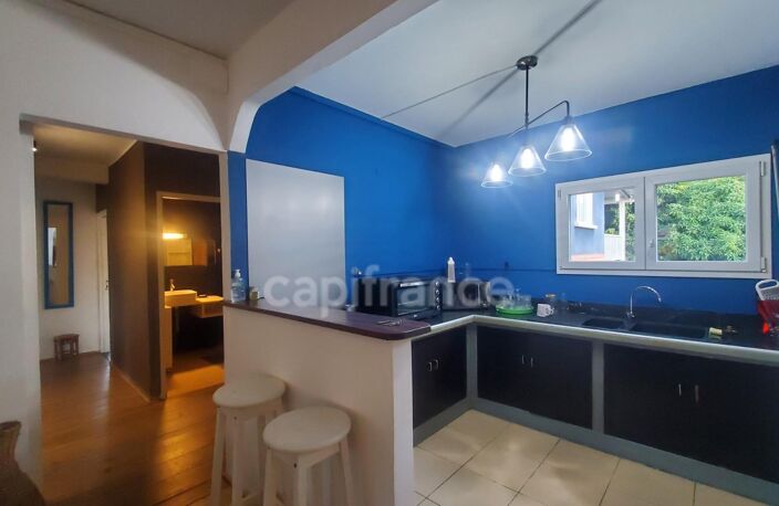 A louer sur Case Pilote - Fond Boucher - Appartement en RDC 4 pièces - jardin et piscine commune — photo 4