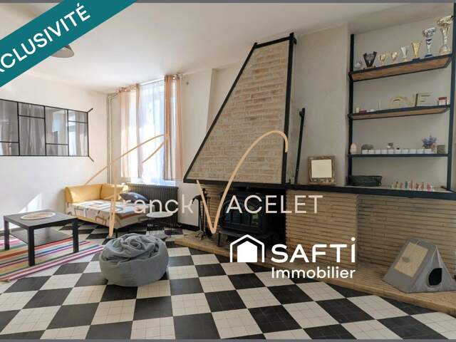 Maison en pierre avec terrasse et local professionnel — photo du bien