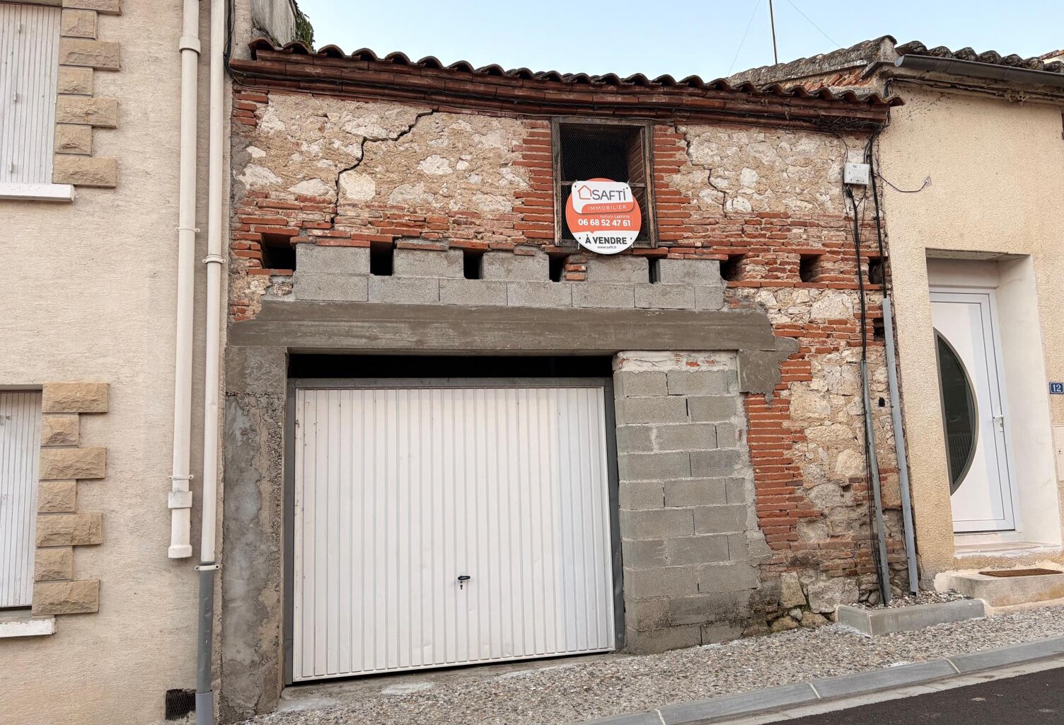 garage et terrain en zone urbaine — photo 1