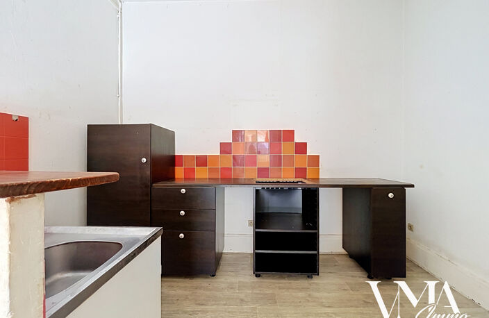 APPARTEMENT T2 DE 42,60 m2 - RUE RAULIN — photo 3