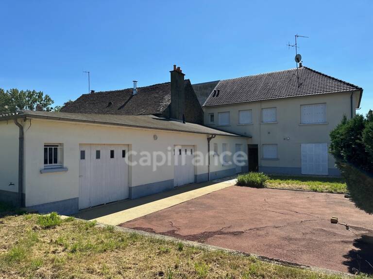Maison avec local commercial à vendre centre ville SAVIGNE L'EVEQUE (72) — photo 1