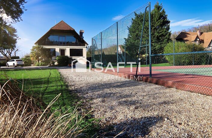 Propriété de caractère rare avec dépendance habitable, terrain de tennis et piscine sur sous sol complet. — photo 2