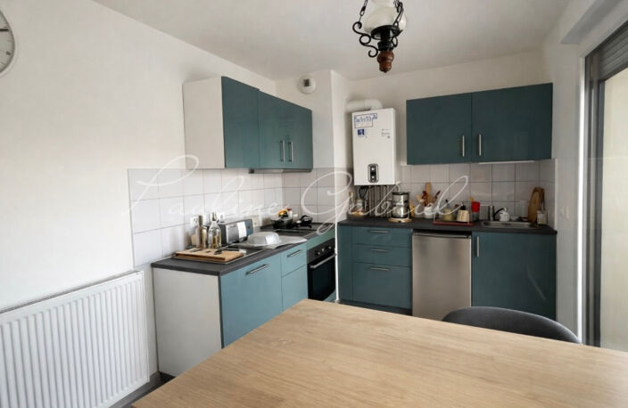 Un appartement moderne, prêt à vivre, au coeur d'un emplacement stratégique — photo 2
