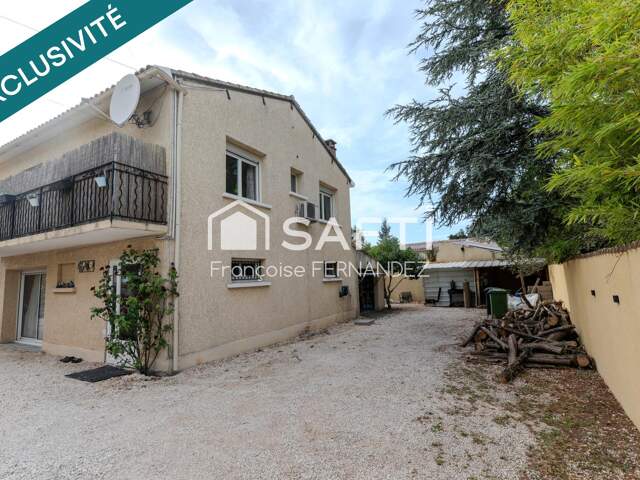 Villa T6 avec jardin proche commerces — photo du bien