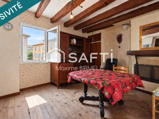 Ensemble immobilier : Maison + grange + terrain en zone constructible — photo du bien