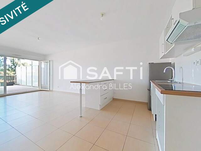 Appartement T3 avec terrasse et place de parking sécurisé — photo du bien