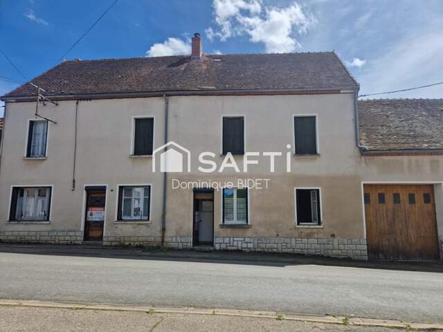 Maison double avec cour intérieure. 3 garages. — photo du bien