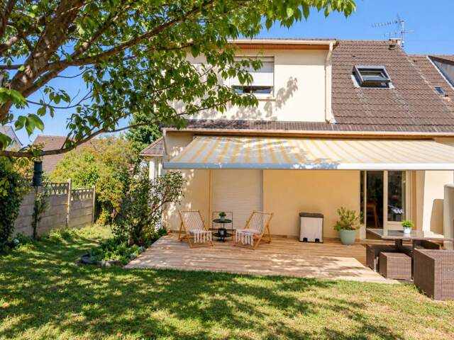 Maison de 5 pièces de 106 m² avec jardin ensoleillé — photo du bien