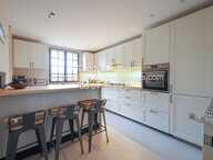 Maison DE VILLAGE DE PIERRES GRAND GARAGE ET JARDIN — photo 2