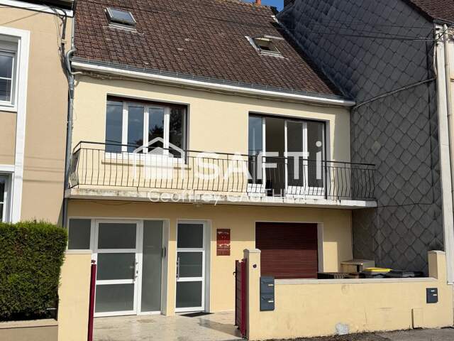Centre-ville : une maison, plusieurs possibilités — photo du bien