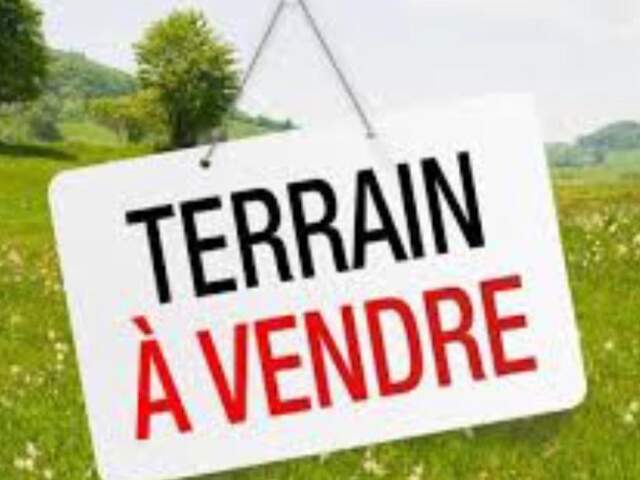 Terrain a bâtir d'environ 805M2 borne et non viabilise avec projet de permis accorde — photo du bien