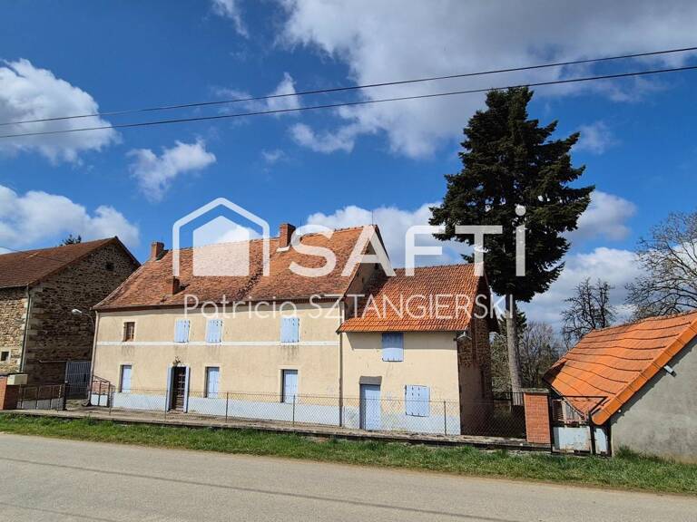 Une maison familiale pleine de caractère, 160 m², 5 chambres, garage 250 m² sur 2 niveaux, proche du lac des fades. — photo 1