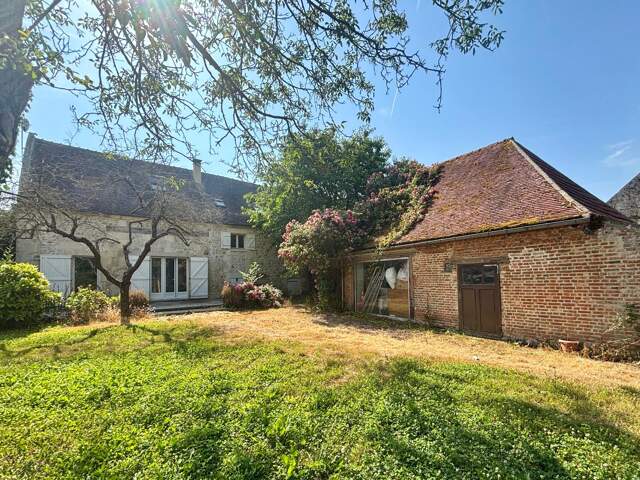 Maison de 117 m² avec jardin et dépendances — photo du bien