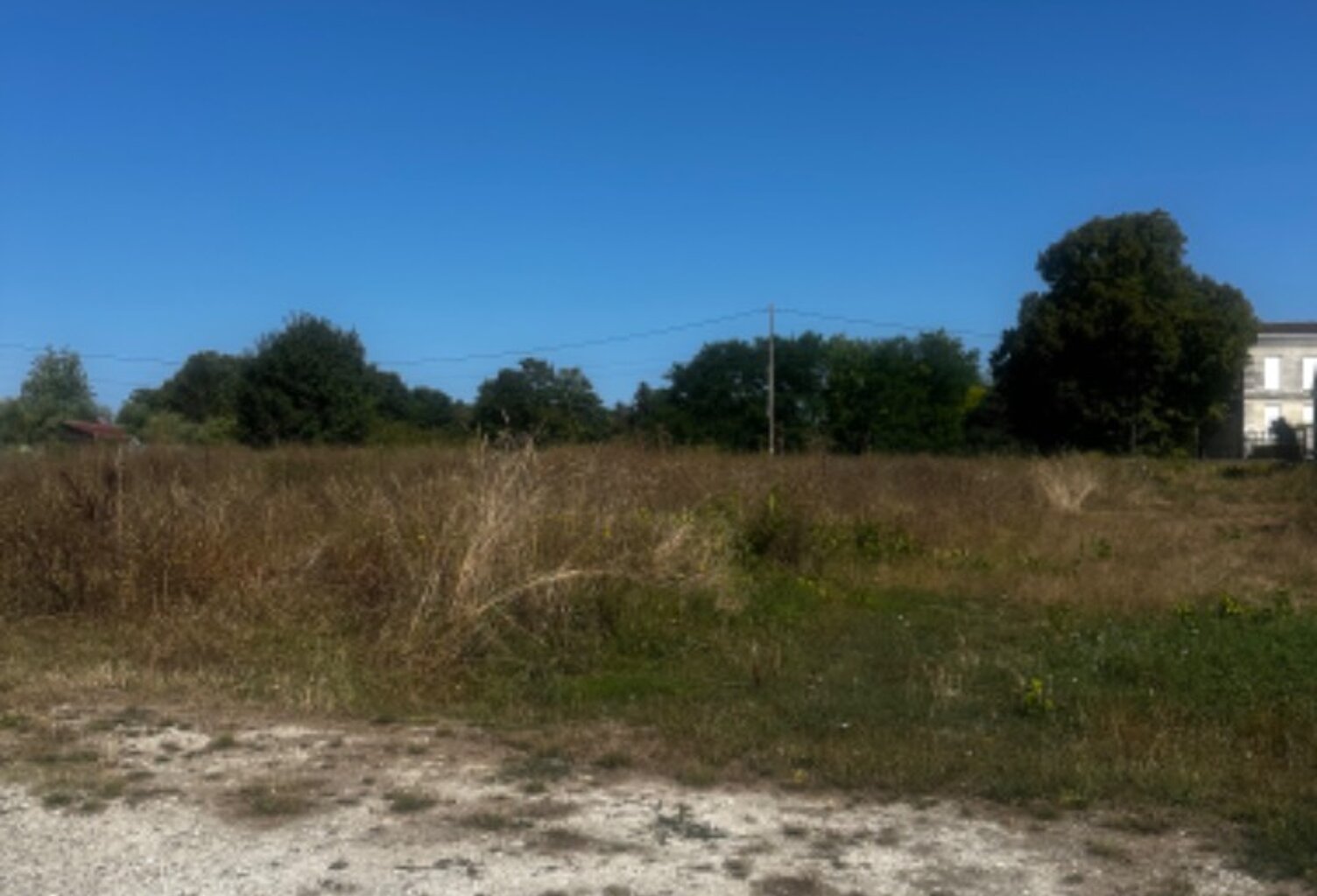 Terrain à bâtir à Saint-Médard-de-Guizières (33230) — photo 1