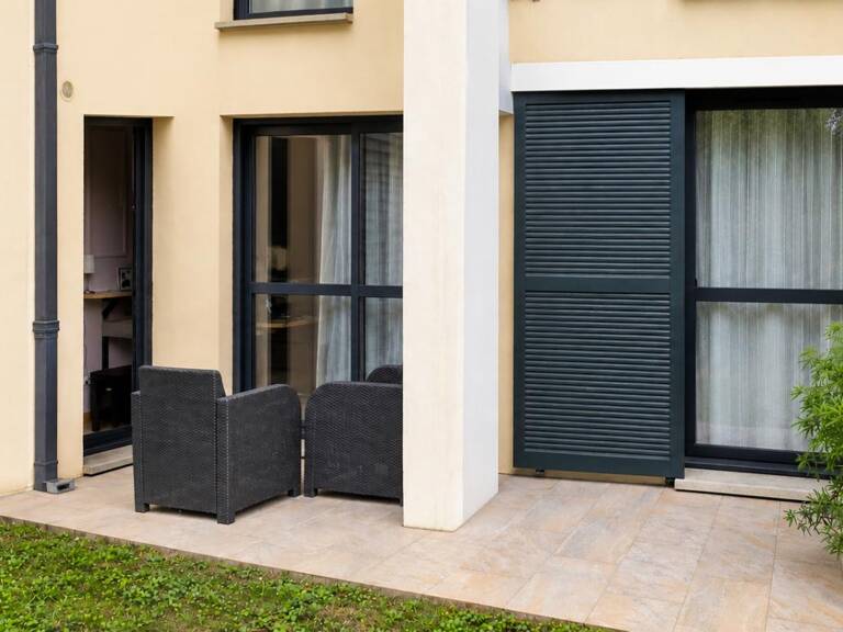 Soissons, F2 en rez-de-jardin avec terrasse et garage fermé — photo 1