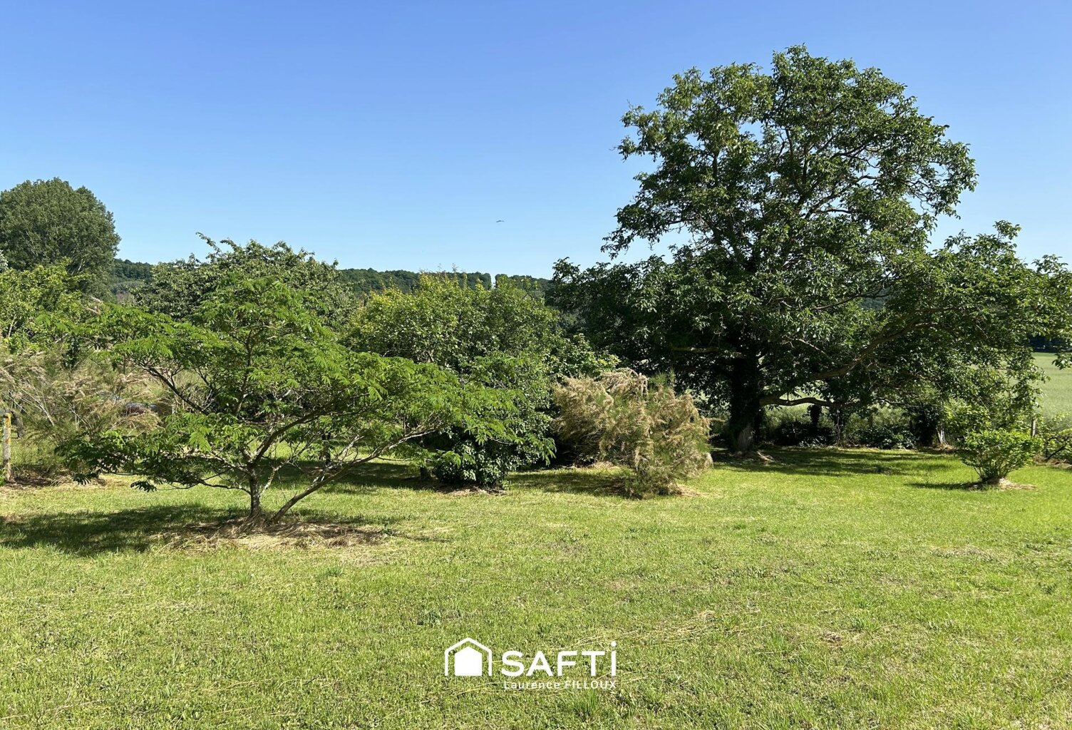 Beau terrain constructible arboré — photo 1