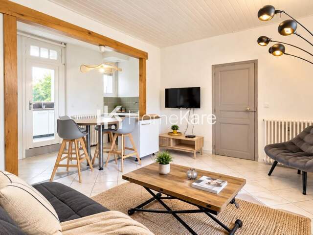 maison de ville avec garage et vie de plain-pied — photo du bien
