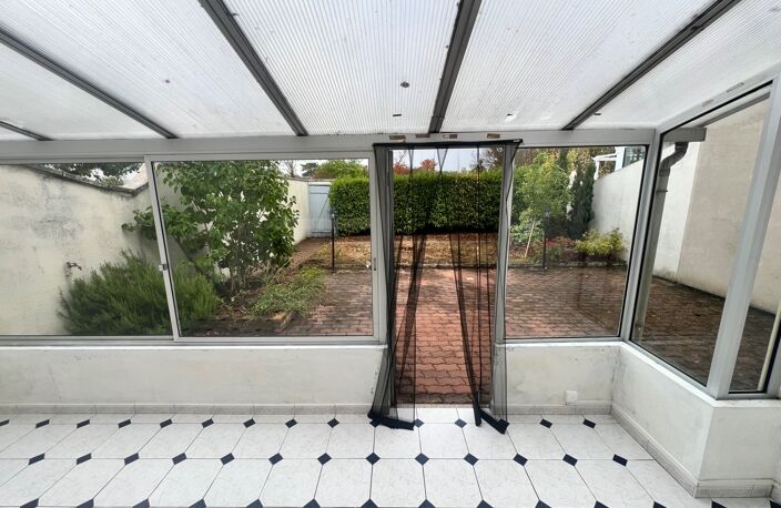 Maison 91 m²- 3 chambres-  Véranda - Jardin-  Garage — photo 4
