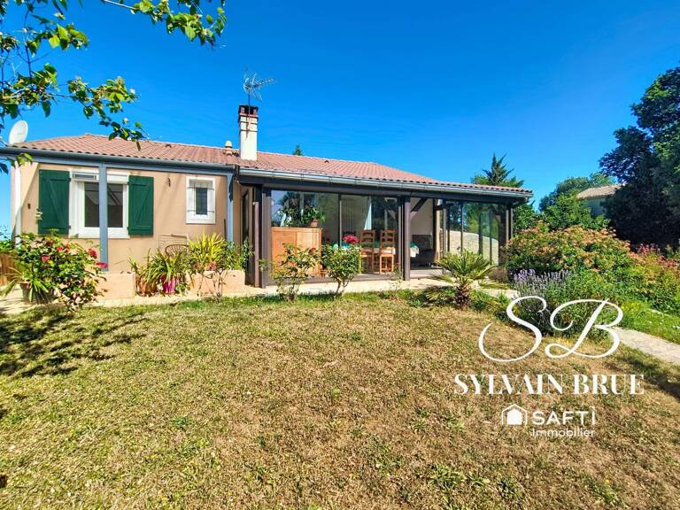 Maison familiale plain pied avec sous-sol aménagé — photo 1