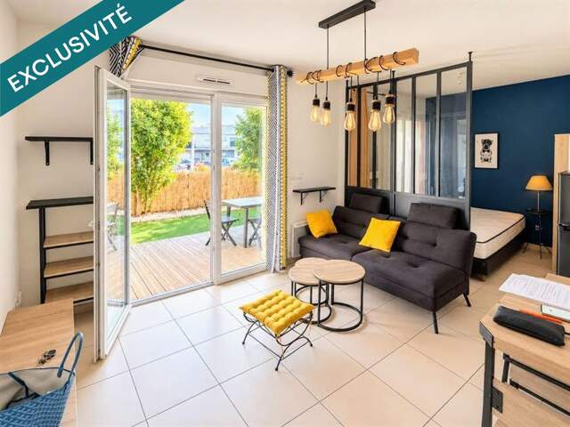 T1 bis en rez-de-jardin avec parking et terrasse — photo du bien
