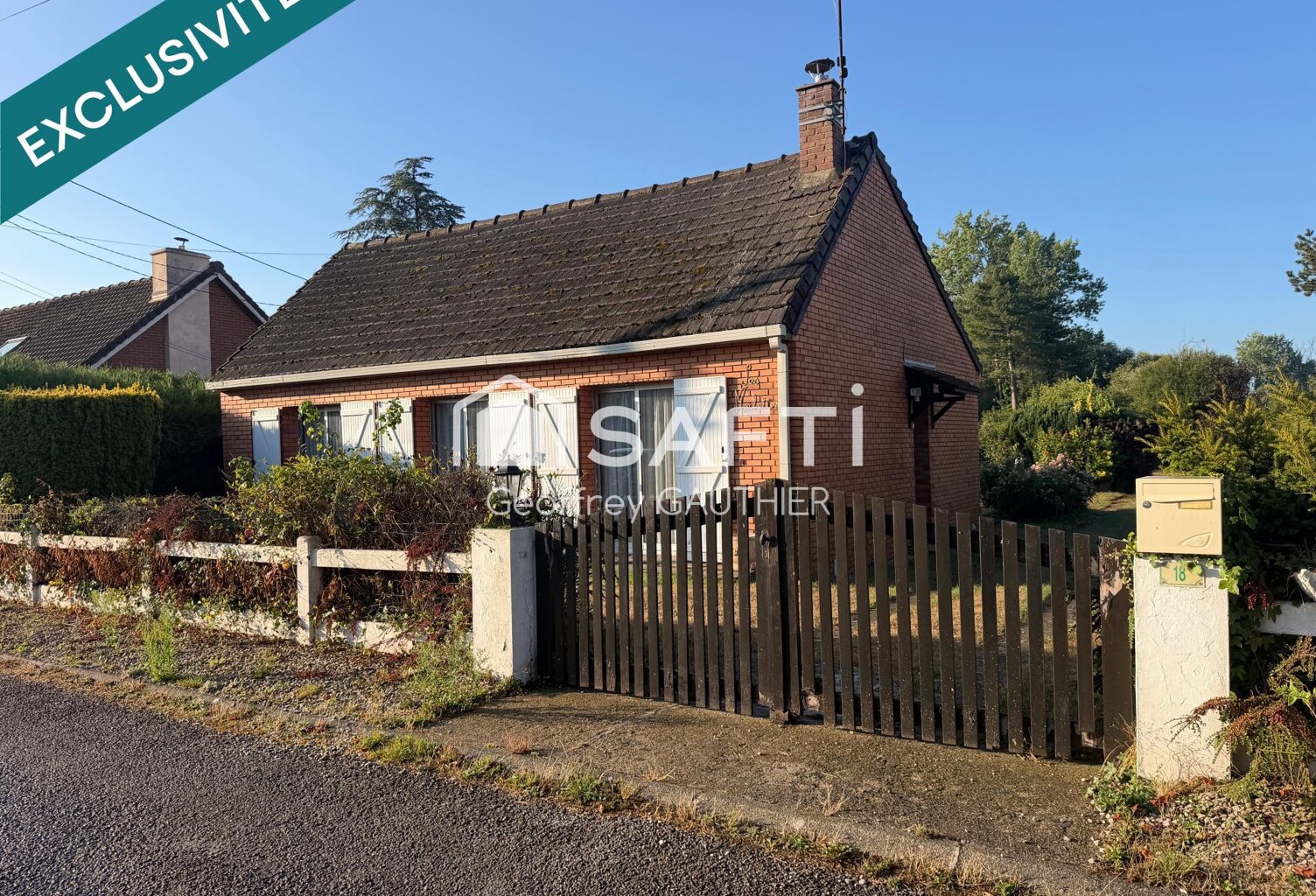Maison de plain-pied avec grand jardin et garage — photo 1