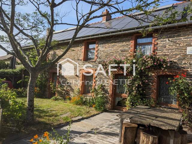 Maison en pierre de 312 m², 11 pièces, 7 chambres. — photo du bien