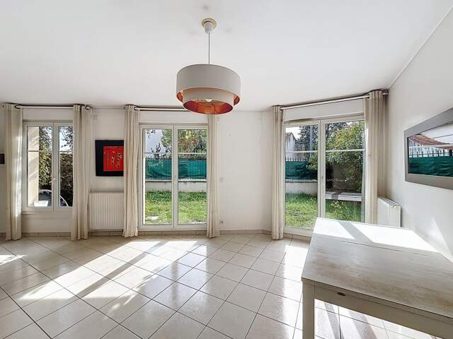 Appartement 3 chambres avec jardin et parking — photo du bien