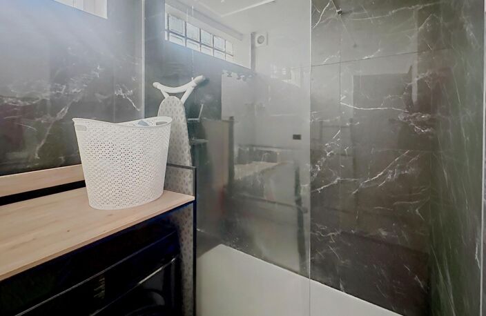 APPARTEMENT 2 CHAMBRES DANS UN QUARTIER IDEAL — photo 4