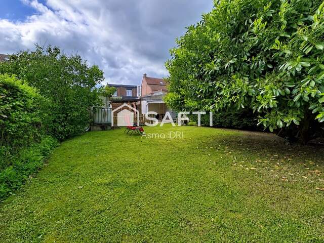 Maison individuelle avec 1 295 m² de terrain arboré — photo du bien