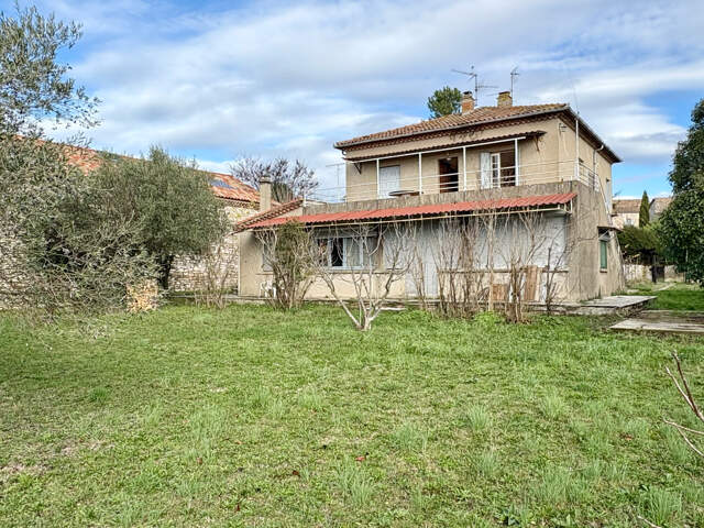 Maison divisée en 2 appartements indépendants+ terrain constructible — photo du bien