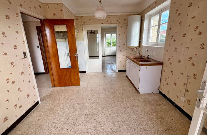 Maison divisée en 2 appartements indépendants+ terrain constructible — photo 4