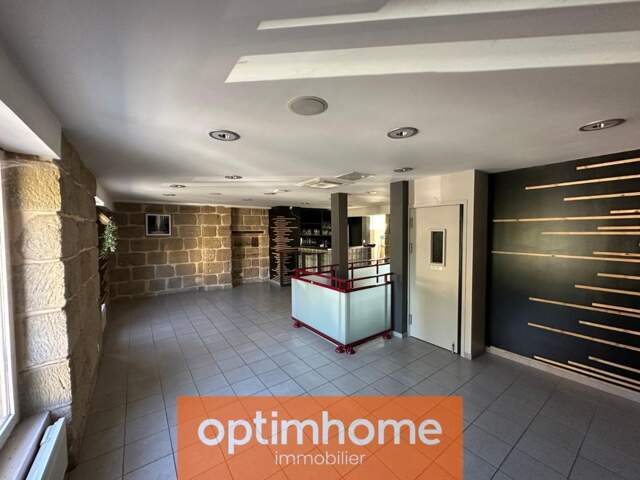 Immeuble professionnel 210 m² – vitrine + jardin 397 m² – Brive — photo du bien
