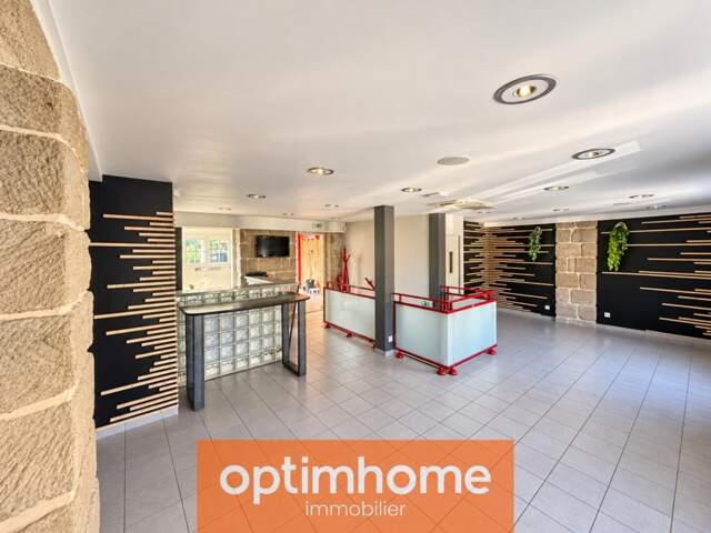 Immeuble professionnel 210 m² – vitrine + jardin 397 m² – Brive — photo du bien