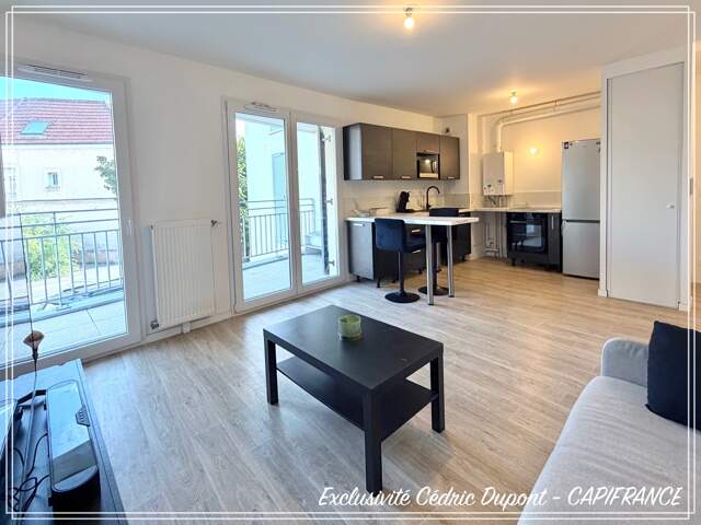 Appartement à vendre 2 pièces COULOMMIERS centre ville (77) - Balcon - Parking - Cave — photo du bien