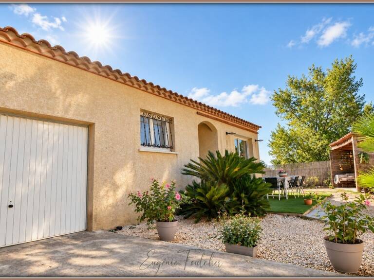 Villa plain-pied avec jardin et garage — photo 1
