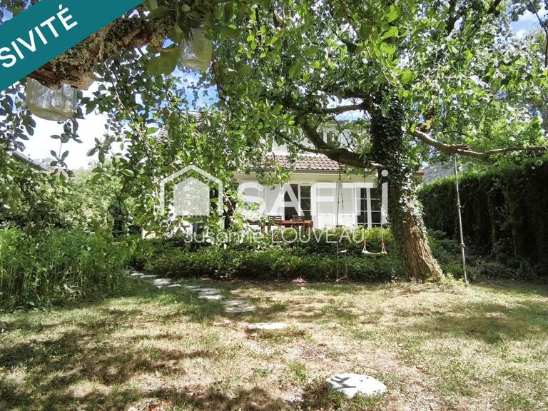 Une maison discrète qui cache un joli privilège — photo 1