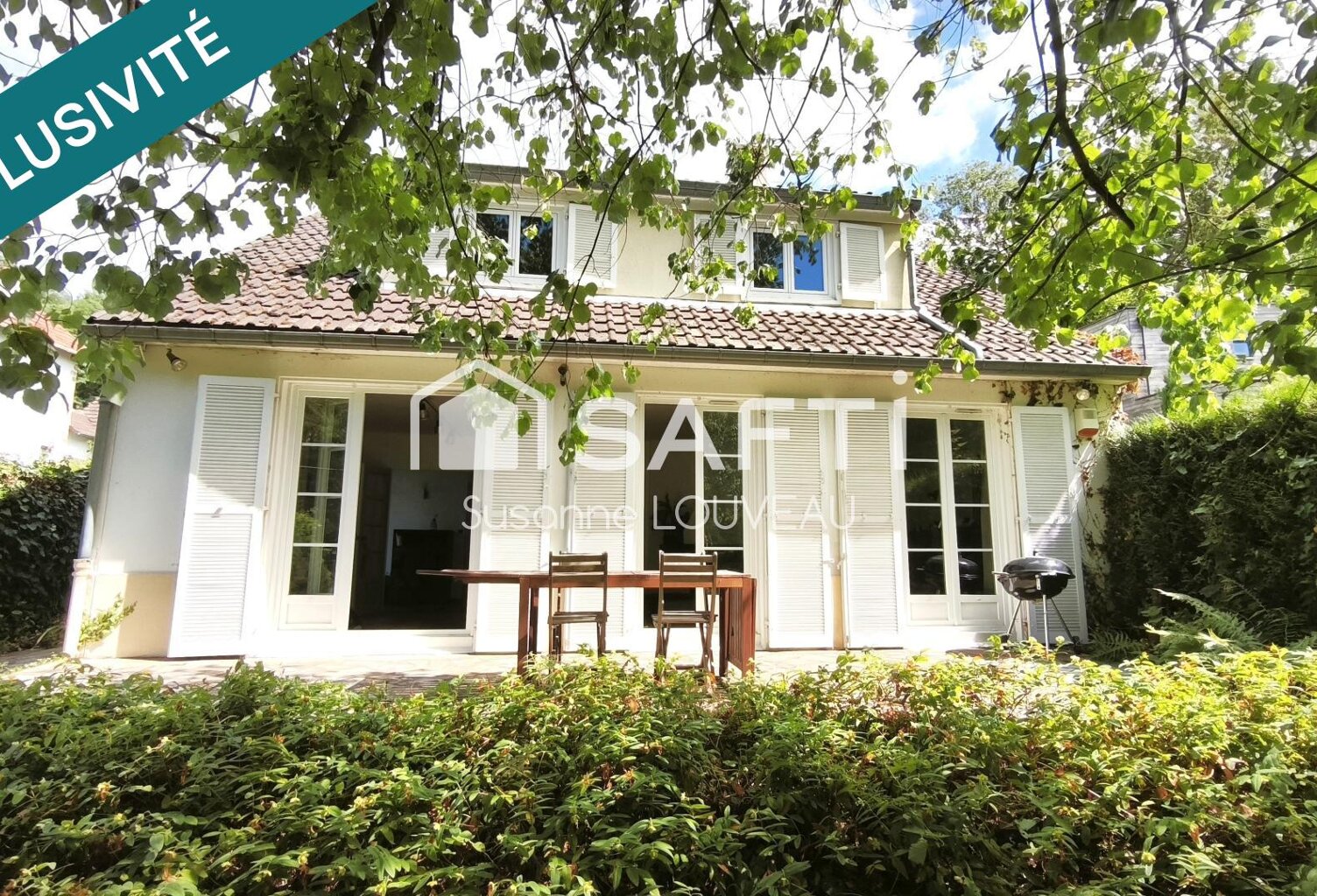 Une maison discrète qui cache un joli privilège — photo 1