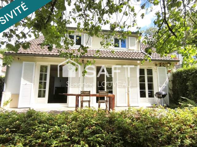 Une maison discrète qui cache un joli privilège — photo du bien