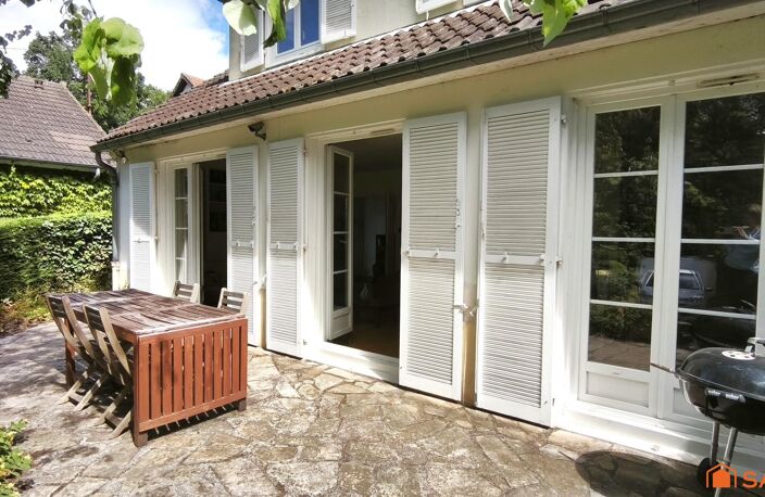 Une maison discrète qui cache un joli privilège — photo 2