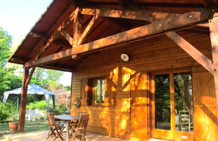 MAISON OSSATURE BOIS DANS SON ECRIN DE VERDURE — photo 3