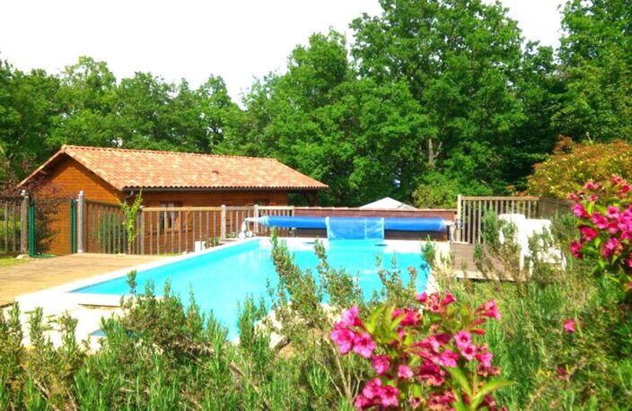 MAISON OSSATURE BOIS DANS SON ECRIN DE VERDURE — photo 4
